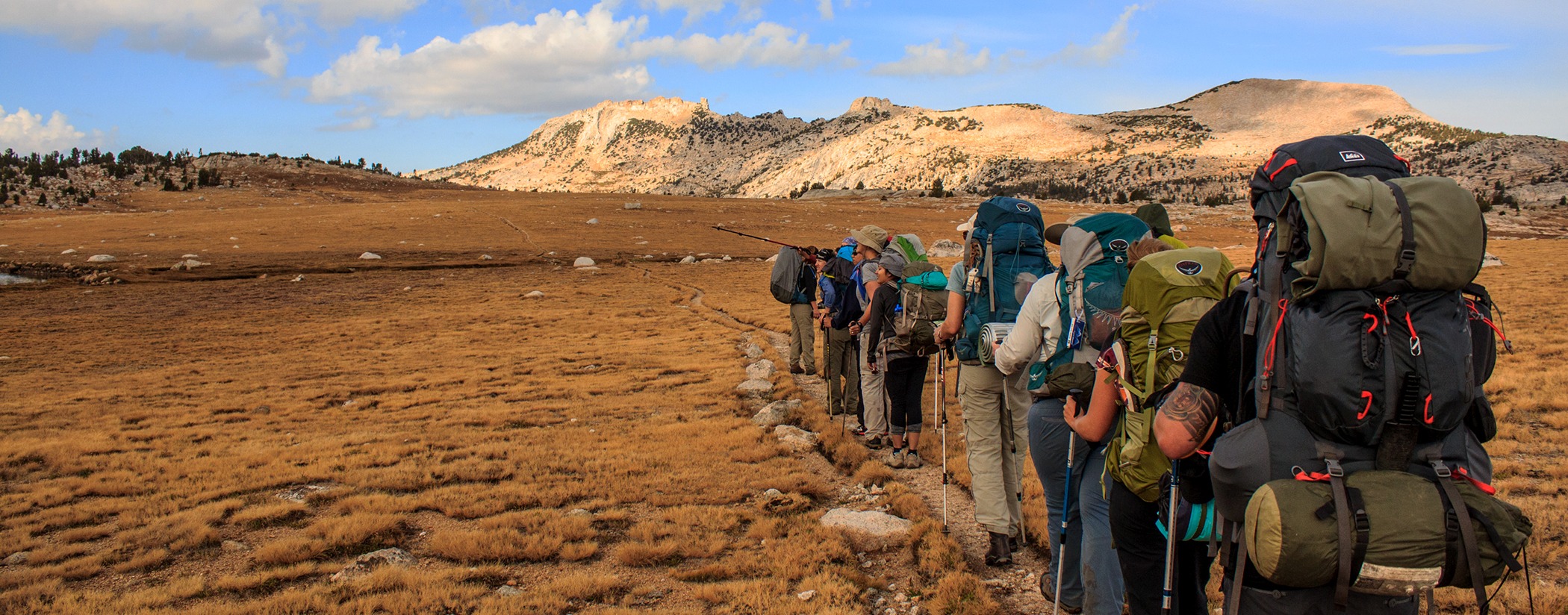 Backpackers hike in Yosemite's high country during a Yosemite Conservancy Outdoor Adventure. Photo: Katrin Hintermeier
