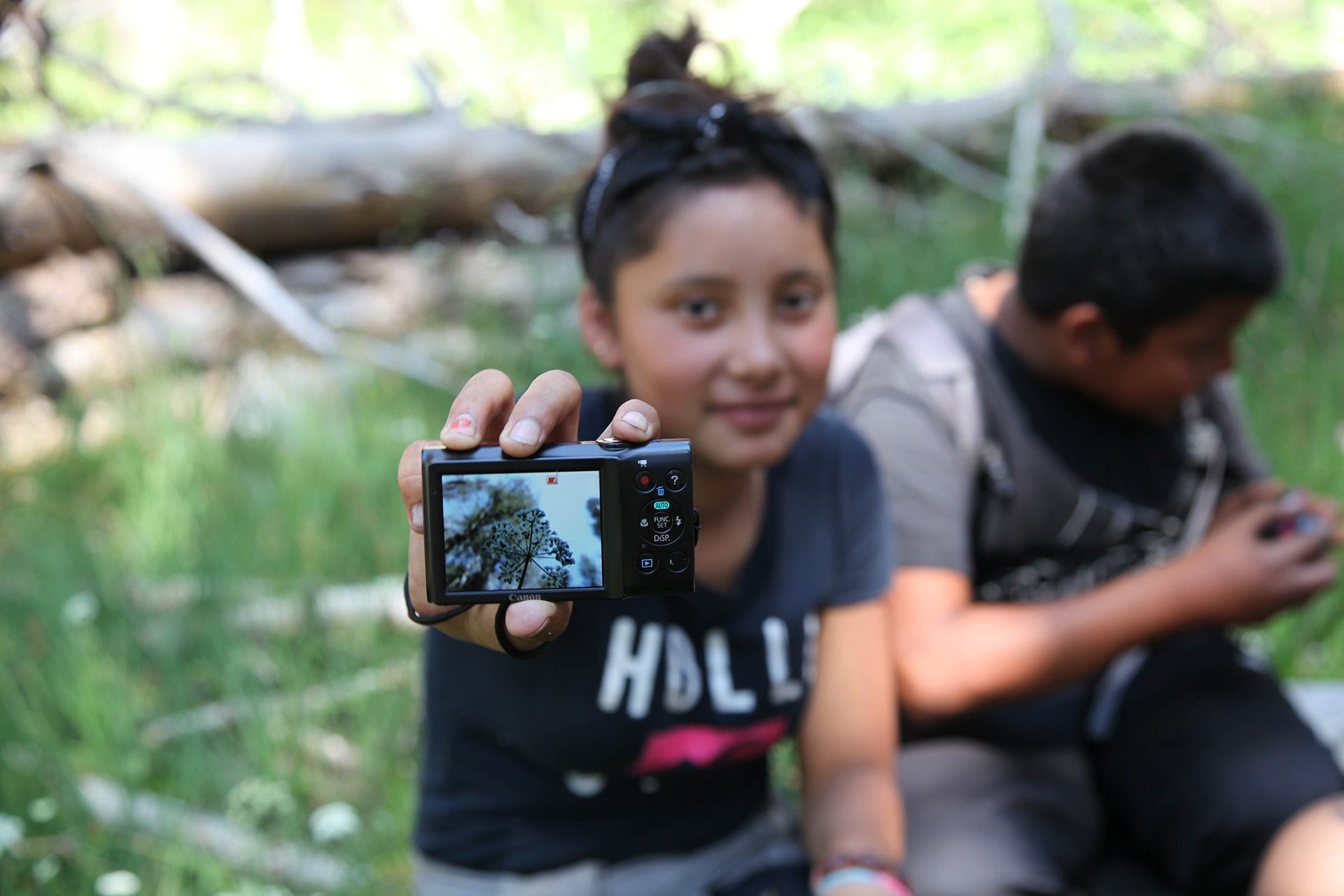 A Parks in Focus student shows off a photo she captured during a Yosemite trip.