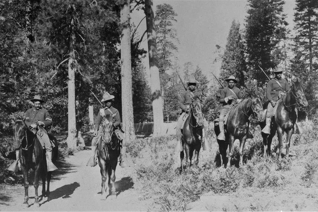 Buffalo Soldiers, pictured here on horseback, would have had unique Yosemite experiences as being both Yosemite's earliest park rangers and coming from an all African American regiment. 
