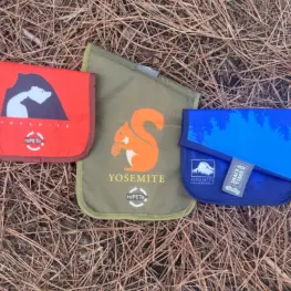Photo of three reusable snack bags, one red, one blue, one khaki green.