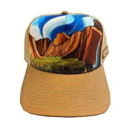 Photo of a brown hat with a detailed illustration of yosemite valley on the top.