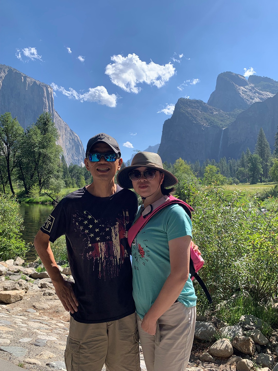 Conservancy donors Peggy Hu and Arthur Xu stand in Yosemite Valley. They chose to support Yosemite Conservancy by sponsoring a bear-proof food locker.