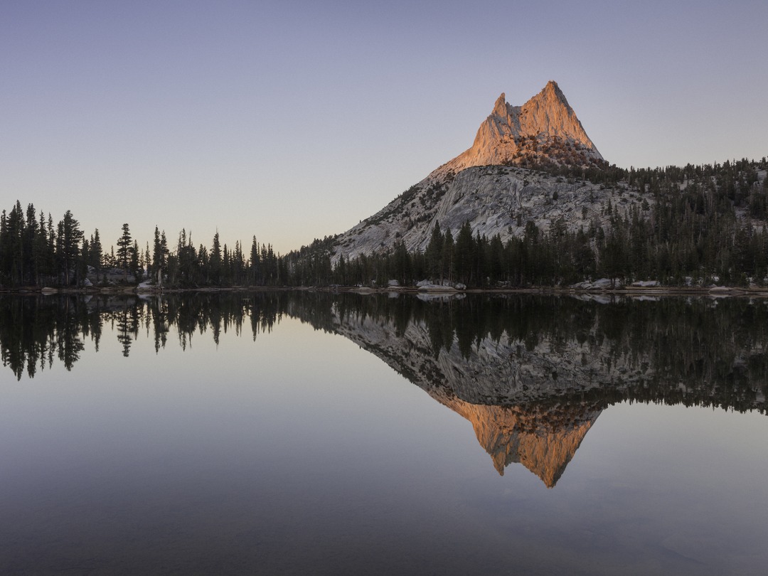 Photo of cathedral peak and it being reflected in the lake