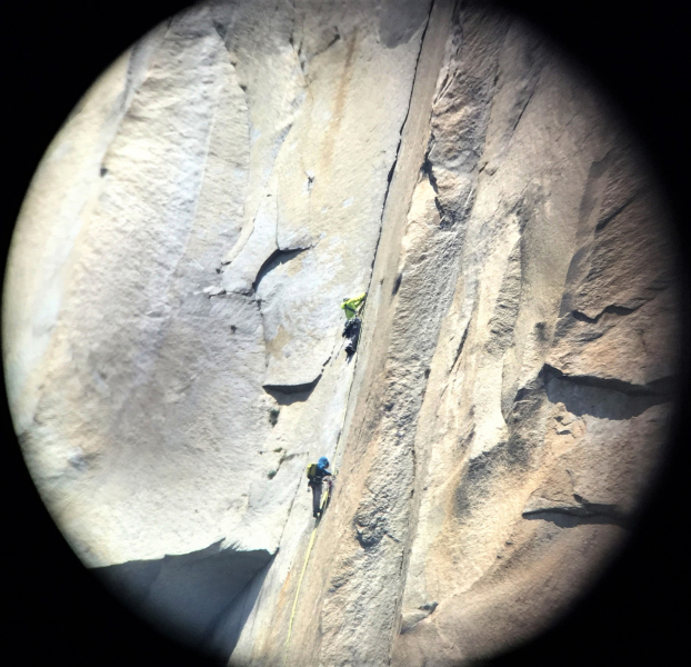 What's it like to climb one of Yosemite's big walls? Through the seasonal Ask a Climber program, Climber Stewards like Chris will introduce you to the vertical world while you look through telescopes — and keep your feet firmly on the ground. Photo: Courtesy of NPS