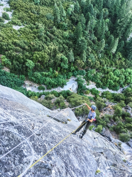 When not educating visitors through the Ask a Climber program, climbing rangers patrol Yosemite's walls. Here, Brandon Adams cuts away abandoned rope near Leaning Tower. Photo: Courtesy of NPS.
