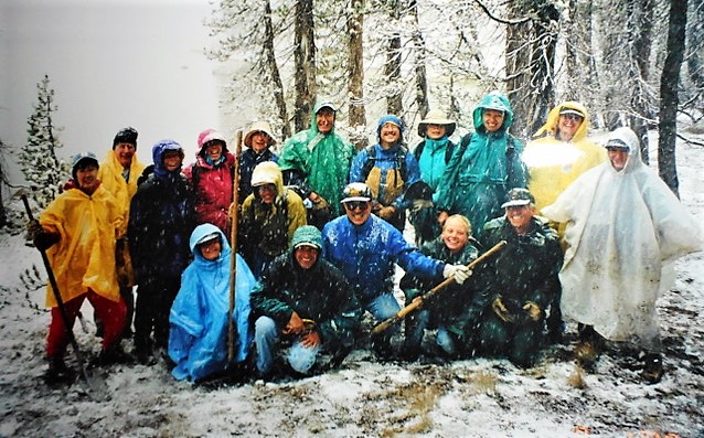 Judy and her fellow volunteers at Elizabeth Lake, ending their week of high country trail restoration in an unexpected snow storm. (Photo courtesy of Judy Johnson)