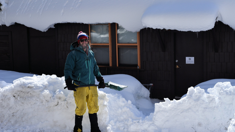 Conservancy Volunteer Coordinator Simon shovels out the field office after a bout of snowy winter weather.