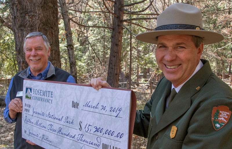 As part of the Spring Gathering celebration in the park, Yosemite Conservancy President Frank Dean presented Yosemite National Park Superintendent Michael Reynolds with a check representing our annual support to the park: $15.3 million. That amount, which includes grants, visitor programs, wilderness services and more, is made possible by our generous supporters. Photo: Al Golub