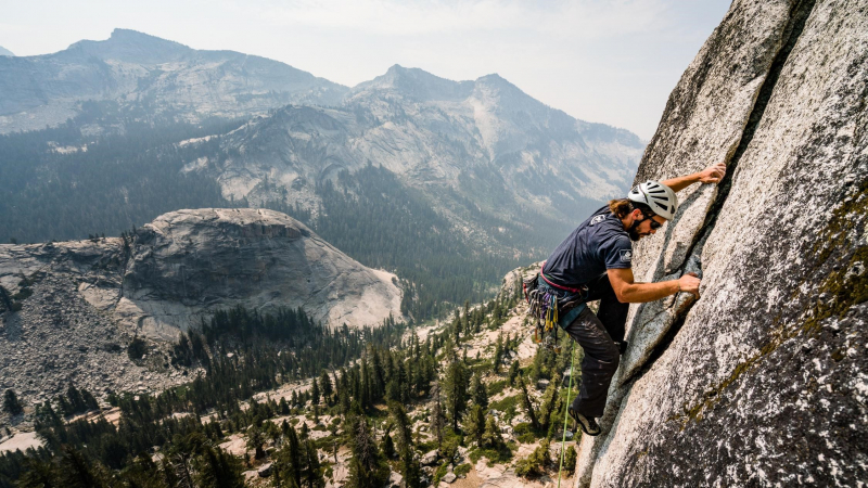 Jorge, one of the eight 2018 Yosemite Climber Stewards, performs a climbing patrol in the Tuolumne Meadows area. While on patrol, climbing rangers and Climber Stewards interact with visitors and remove discarded ropes or gear. Photo: NPS