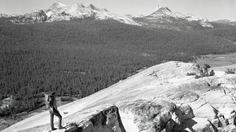 This 1967 image of a hiker on Lembert Dome is one of more than 6,000 newly digitized photos from the Yosemite Archives. Photo: NPS/E.P. Menning (YOSE 96473, public domain)
