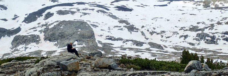Naturalist Pete Devine spends some quality time near the base of Mount Lyell, one of his top picks for Outdoor Adventure trips. For years, he has trekked to this part of the park to study Yosemite's last remnants of glacial ice. Photo: Roy Williams Photography