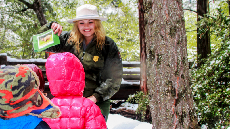 On some winter days, rangers like Jessica Rivas (a Yosemite Leadership Program alum!) get to introduce young visitors to a hushed, snow-covered Yosemite that many visitors never experience. Photo: NPS