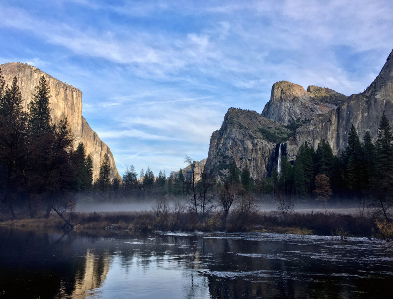 I lived in Yosemite this summer and fall and the last day before I moved was immeasurably beautiful. This is Bridalveil Fall on the right and El Capitan on the left, looming over a misty meadow.