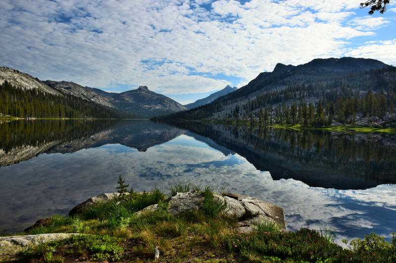 This was taken in August 2017 on a backpacking trip that began at Hetch Hetchy, went to Lake Vernon, Tilden Lake, and finally Rancheria Falls. This was taken on the morning of Day 3. It was a gorgeous beginning to a nearly 16 mile day to Rancheria Falls that evening. The morning over the lake was perfect with the water allowing for an almost perfect reflection of the sky and the mountains beyond. It was the perfect view to start a long, hard day. Thankful for Yosemite and all the memories I have been able to create both in the valley and in the back country.