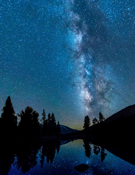 The Milky Way stretches through the sky above Tioga Pass. Note the faint green 