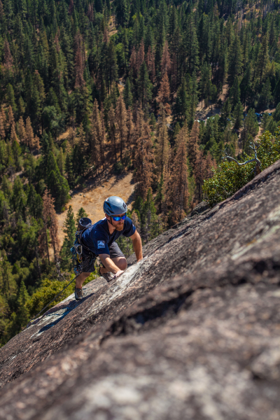 As a Yosemite Climber Steward, Chris spends a lot of time on the walls! Here, he leads a climb up Nutcracker, a popular route in Yosemite Valley. Photo: NPS/Kyle Queener