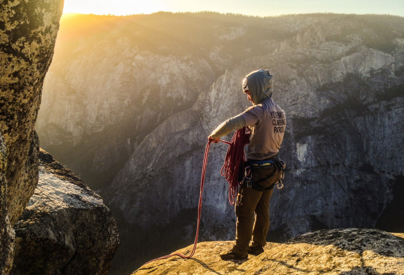 As part of climbing patrols, Yosemite rangers and stewards connect with climbers, scope out routes, and retrieve ropes and other discarded gear. Photo: NPS/Eric Bissell