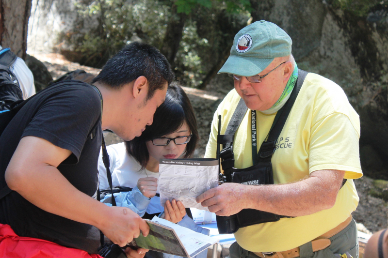 PSAR volunteer Steve helping visitors at Happy Isles. Photo: Courtesy of NPS