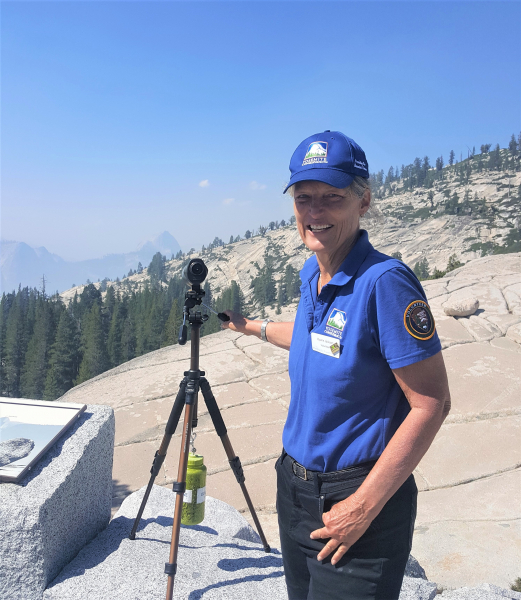 Yosemite Conservancy volunteer Dyane spent part of August stationed at Olmsted Point, answering visitor questions and helping people peer toward Half Dome through a telescope.